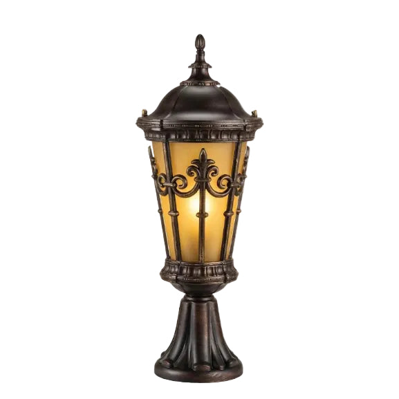 Decorative outdoor lamp with intricate design on a white background