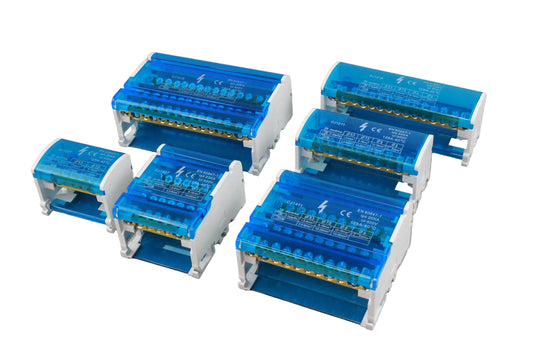 Set of blue and white electrical connectors on a gray background