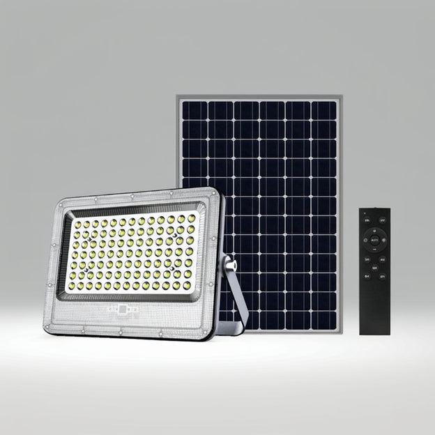 Solar flood light with solar panel and remote control on a gray background
