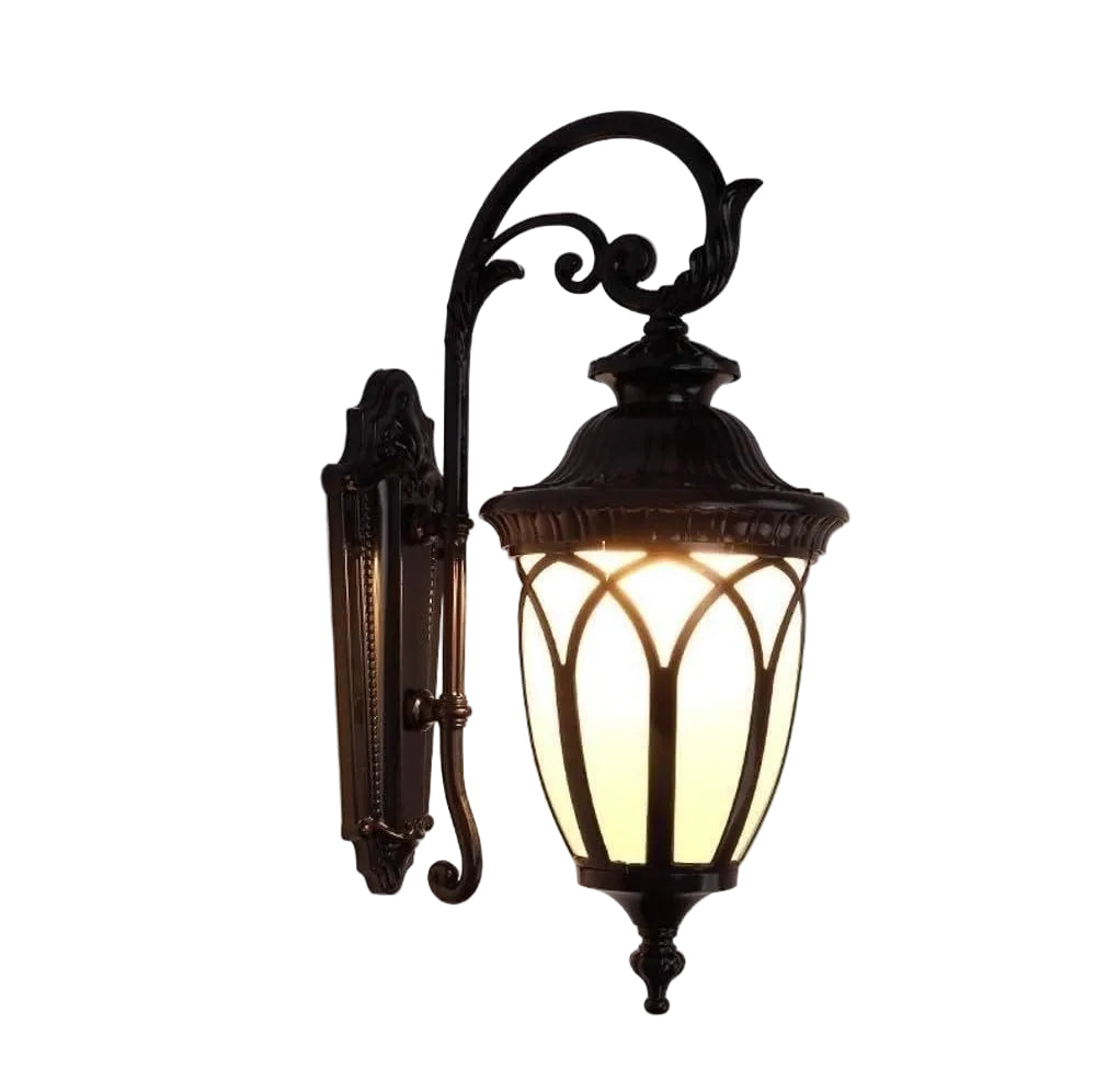 Decorative outdoor wall light fixture on a white background