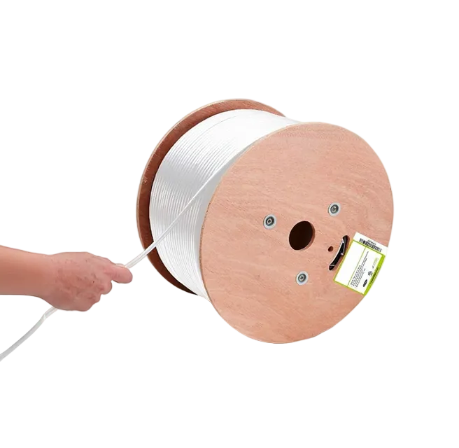 Spool of white cable with a hand pulling on it against a white background