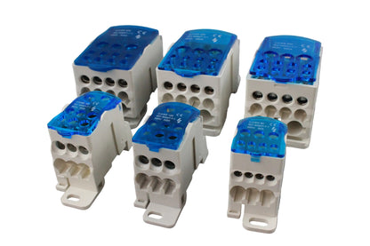 Set of six electrical connectors with blue tops on a gray background
