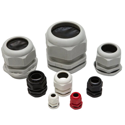 Collection of various cable glands on a white background