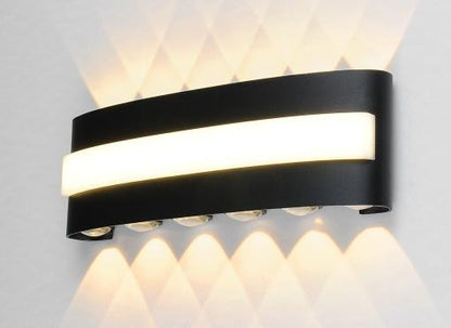 AURA Outdoor Curved Wall Light – Black, 30 cm (12W, Warm White 3000K) – lit, up and down beams