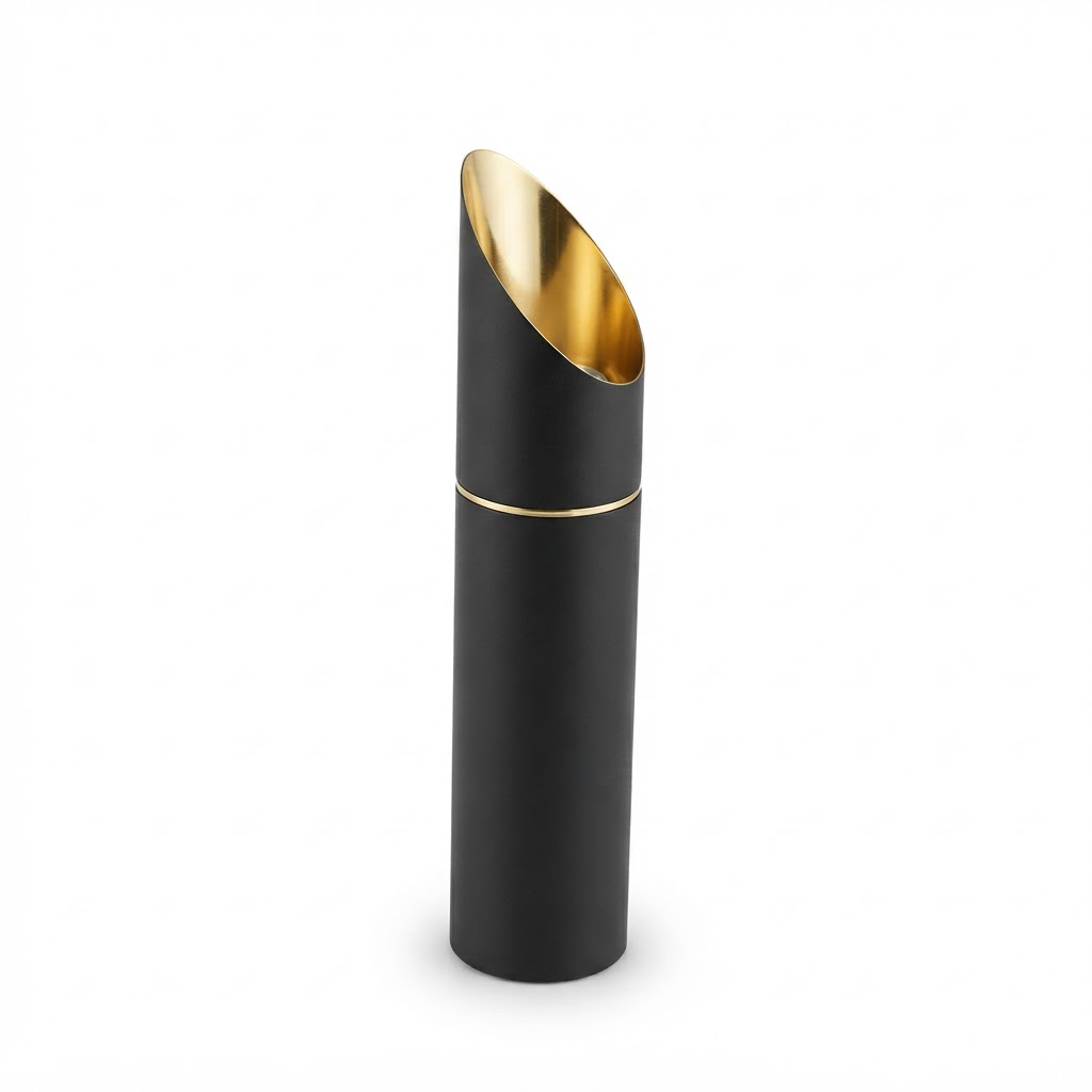 Aura Spotlight 670-H300 matte black cylindrical LED surface spotlight with gold interior on white background