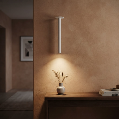 Aura Finger Light 12C021-H300MM installed in a modern hallway above a console table